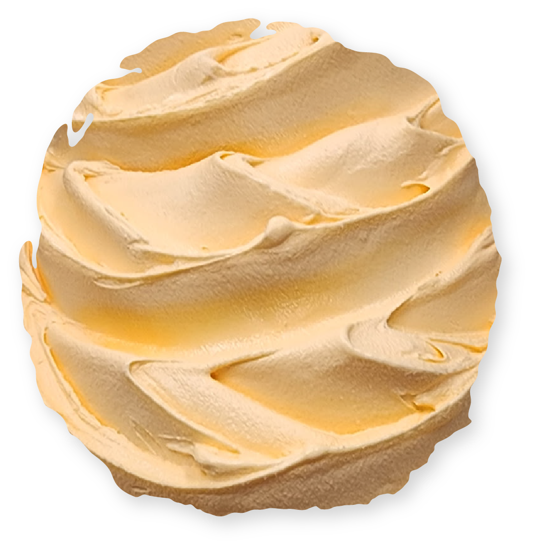 Swirled light-yellow buttercream frosting, possibly on a cupcake, in a circular shape.