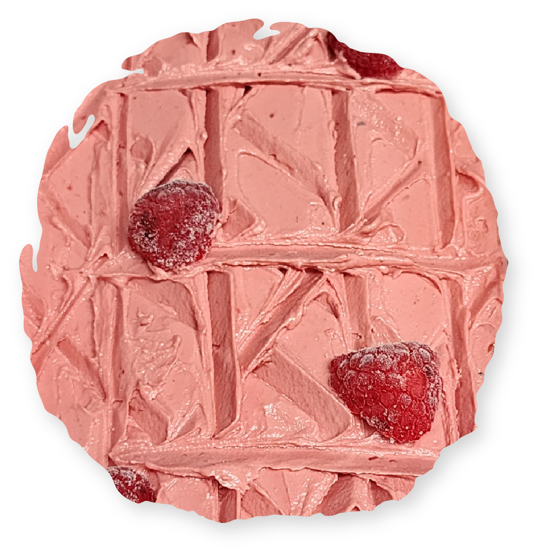 Pink frosted waffle with two raspberries.