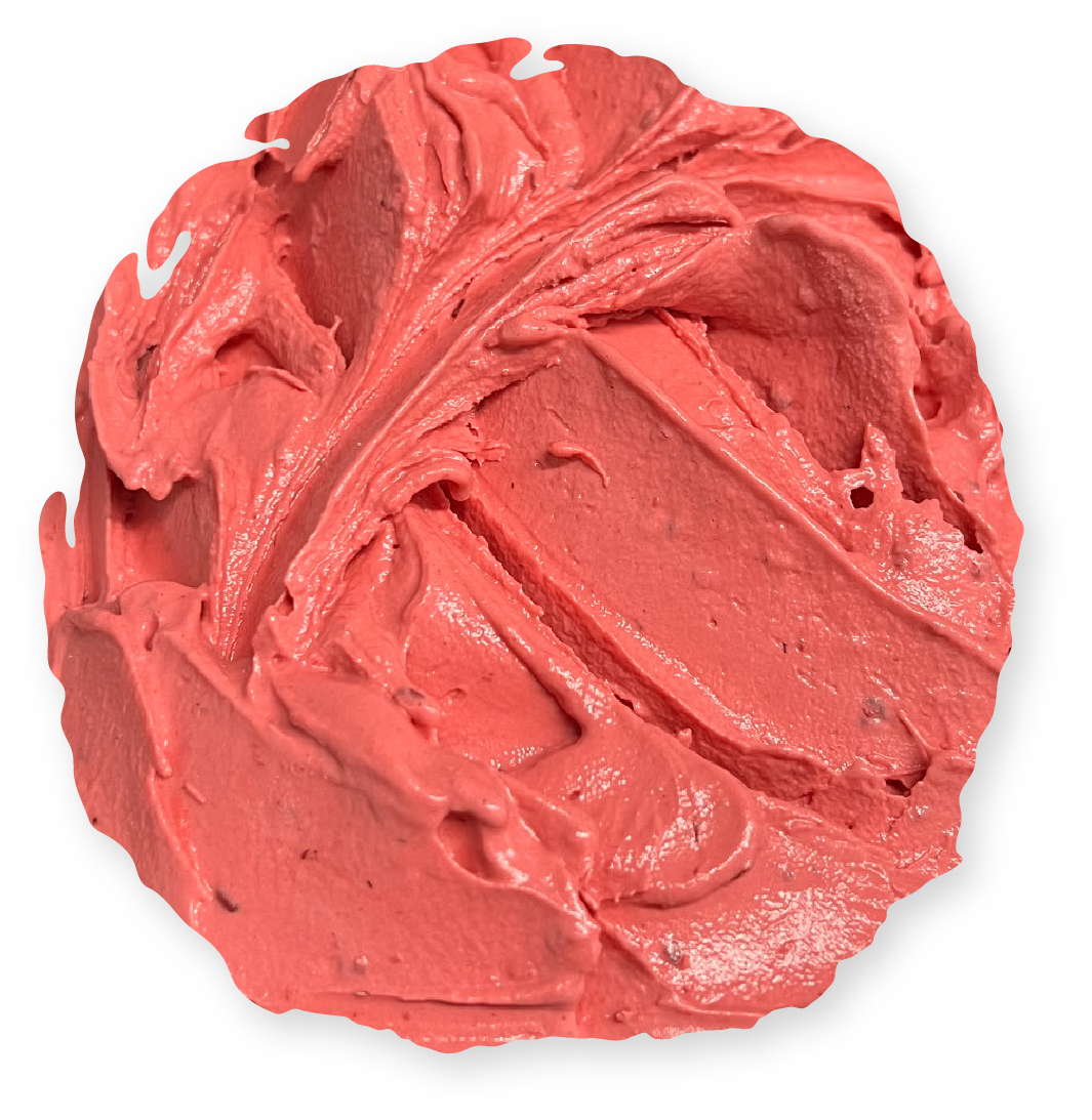 Swirled coral-colored frosting, textured and thick, on a white background.