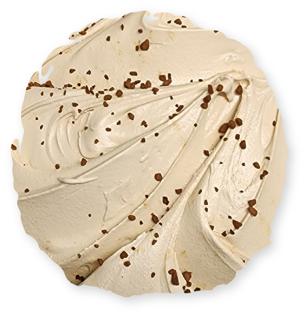 Swirled cream with chocolate sprinkles.