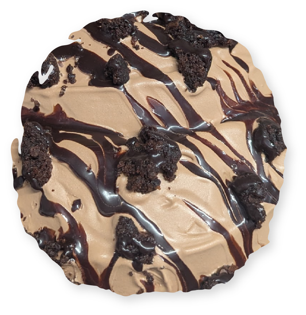 Chocolate ice cream sundae with brownie pieces and chocolate sauce.