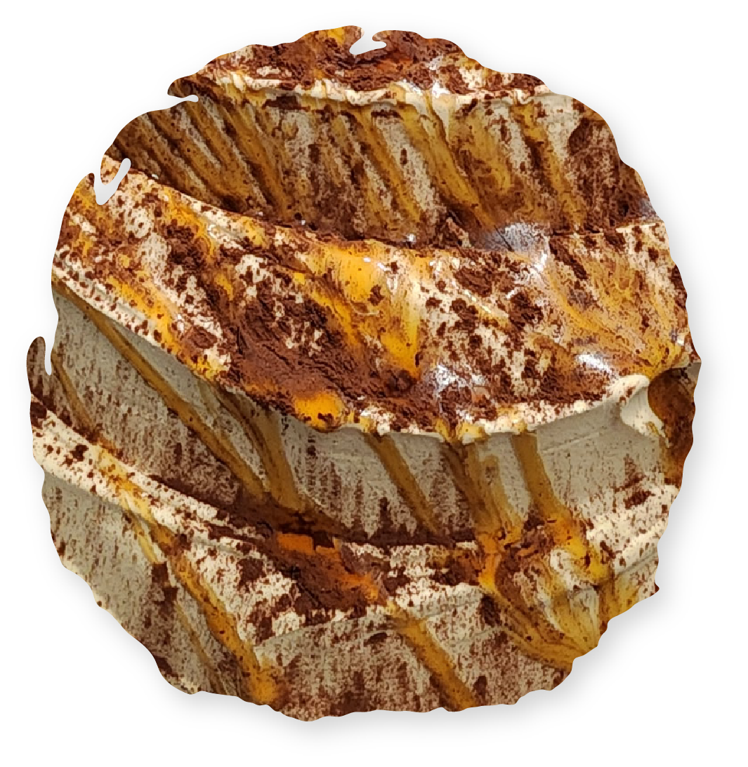 Round, layered cake with white, brown, and orange frosting.