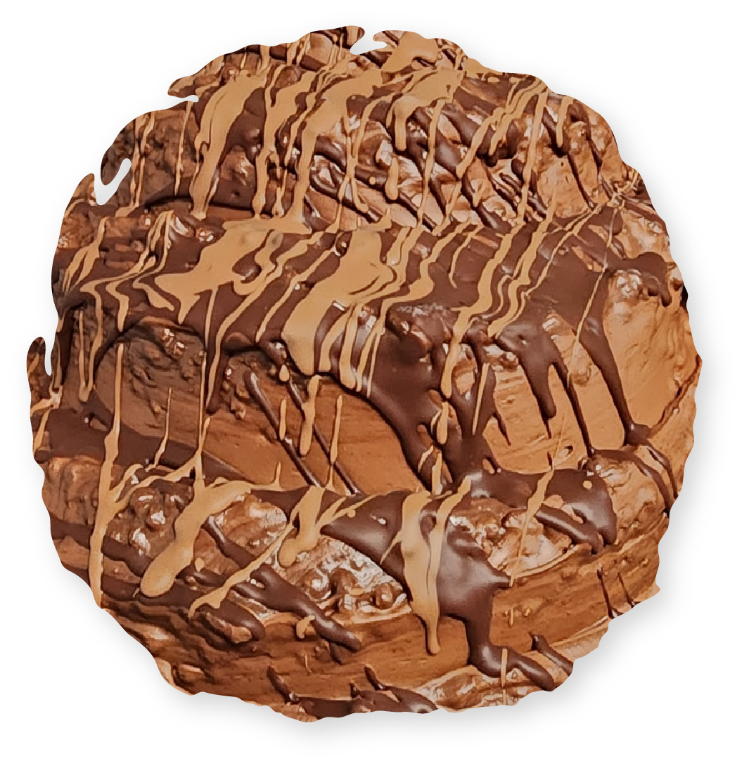 Chocolate cake with chocolate and caramel drizzle.