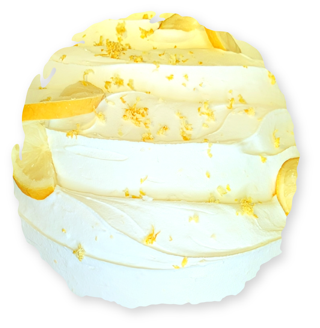 Lemon buttercream frosting swirled high, garnished with gold leaf.