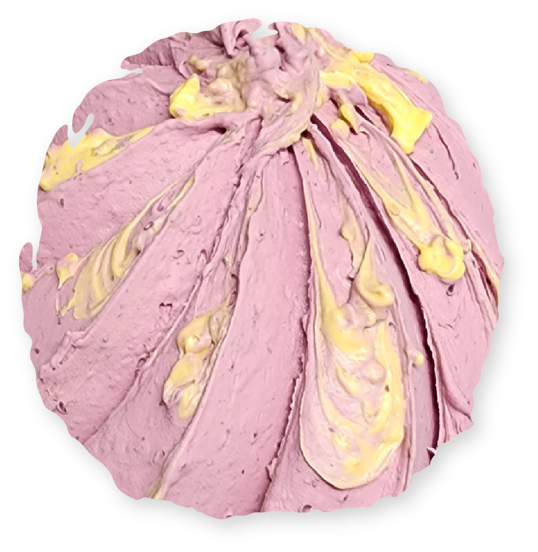 Purple and yellow swirled bath bomb.