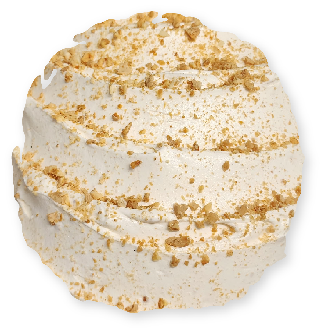 Scoop of light-colored ice cream, swirled and topped with crunchy crumbs.