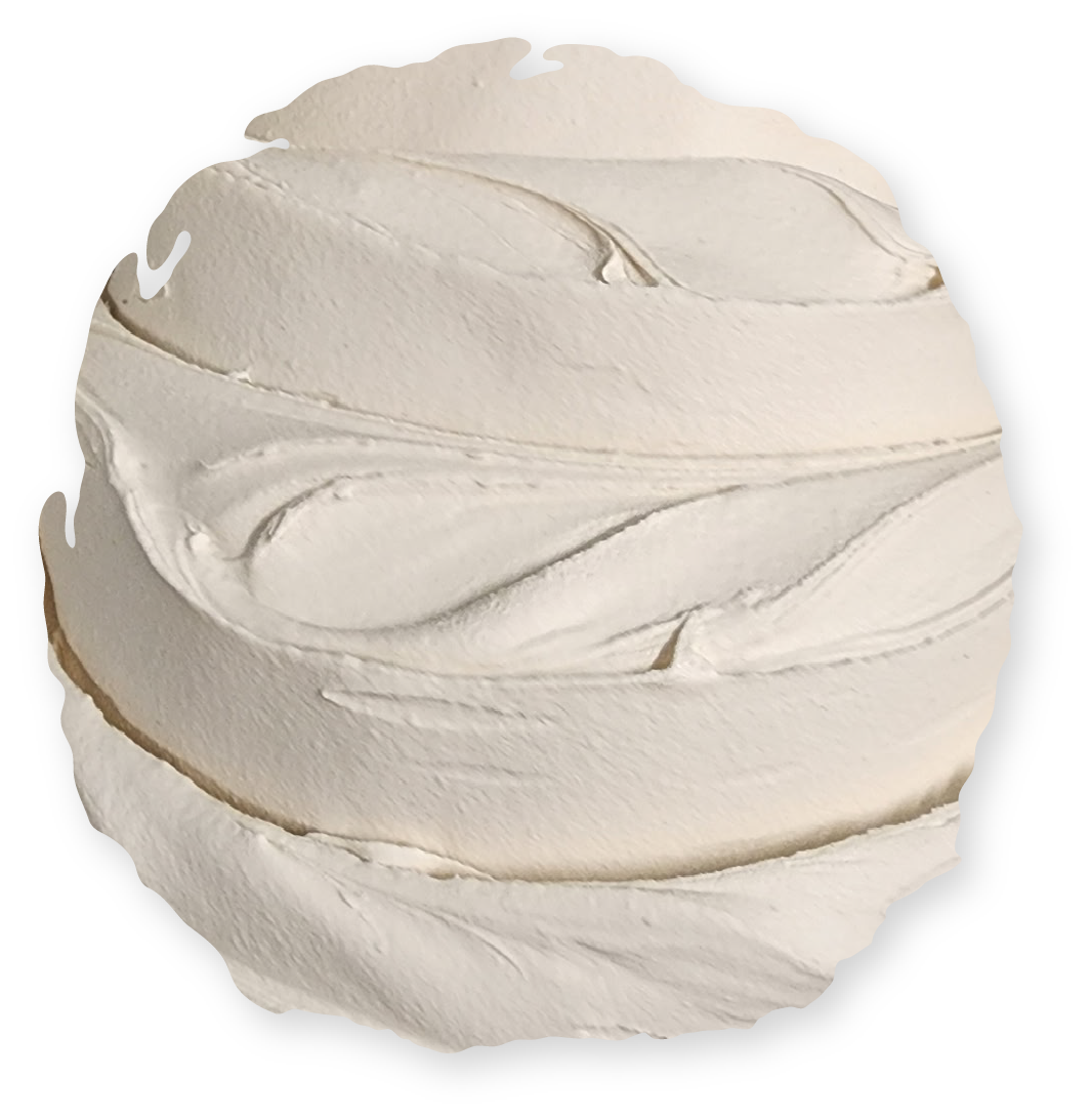 Cream-colored sphere with spiraling, textured ridges; suggesting a sculpted or layered form.