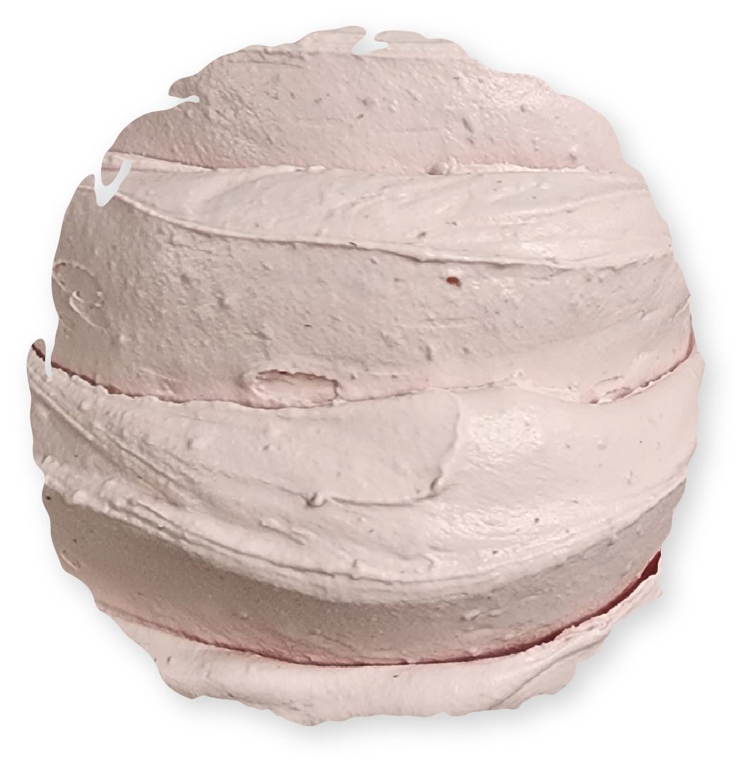 Light pink swirled frosting on a sphere.