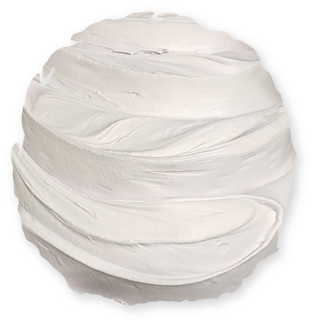 Swirled white icing, shaped like a globe, on a white background.