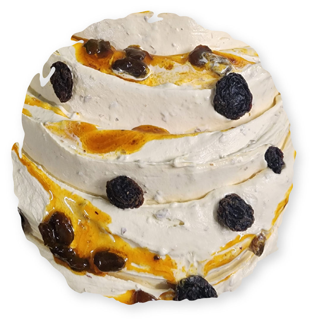 Whipped cream dessert swirled with caramel and raisins.