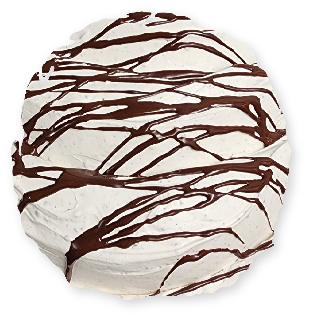 Round cake with white frosting and drizzled chocolate.