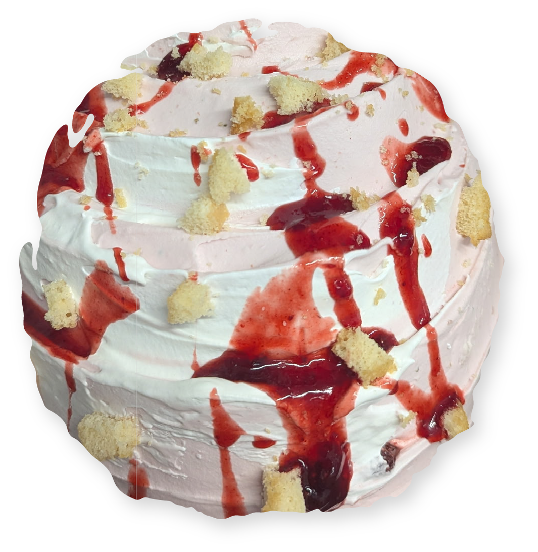 Strawberry shortcake with red sauce and cake crumbles.