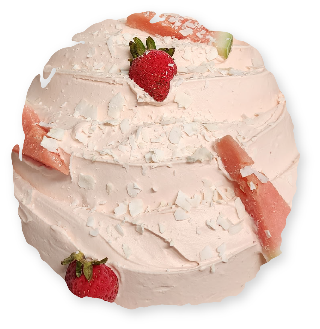 Strawberry meringue cake with pink frosting and fresh fruit.