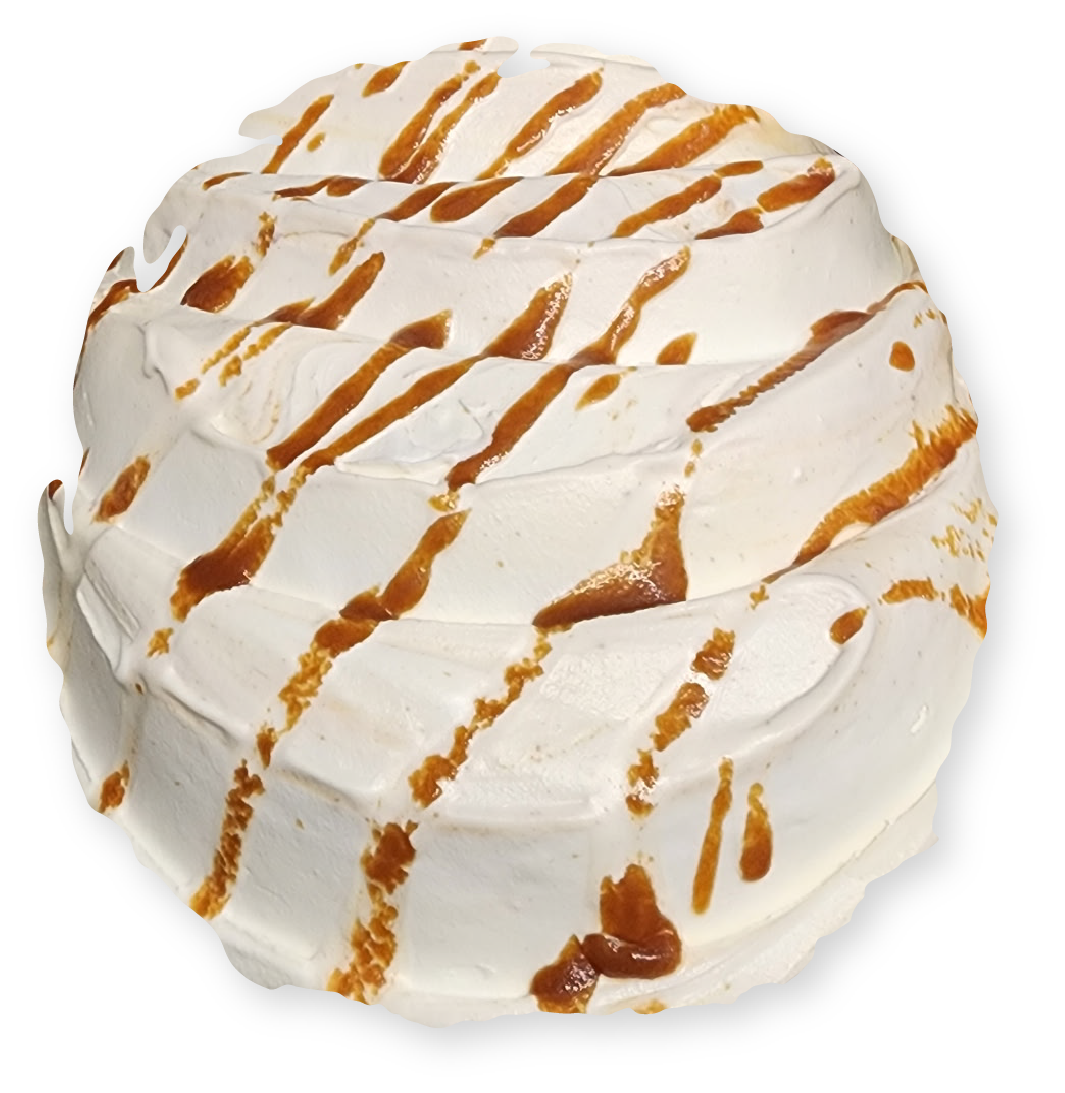 Whipped cream dessert with caramel drizzle.