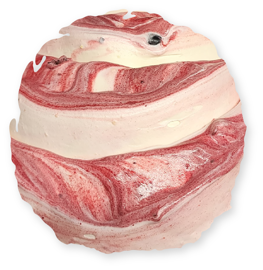 Swirled red and white bath bomb.