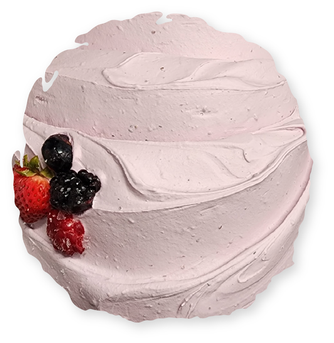 Pink frosted dessert, spiral design, topped with strawberries and berries.