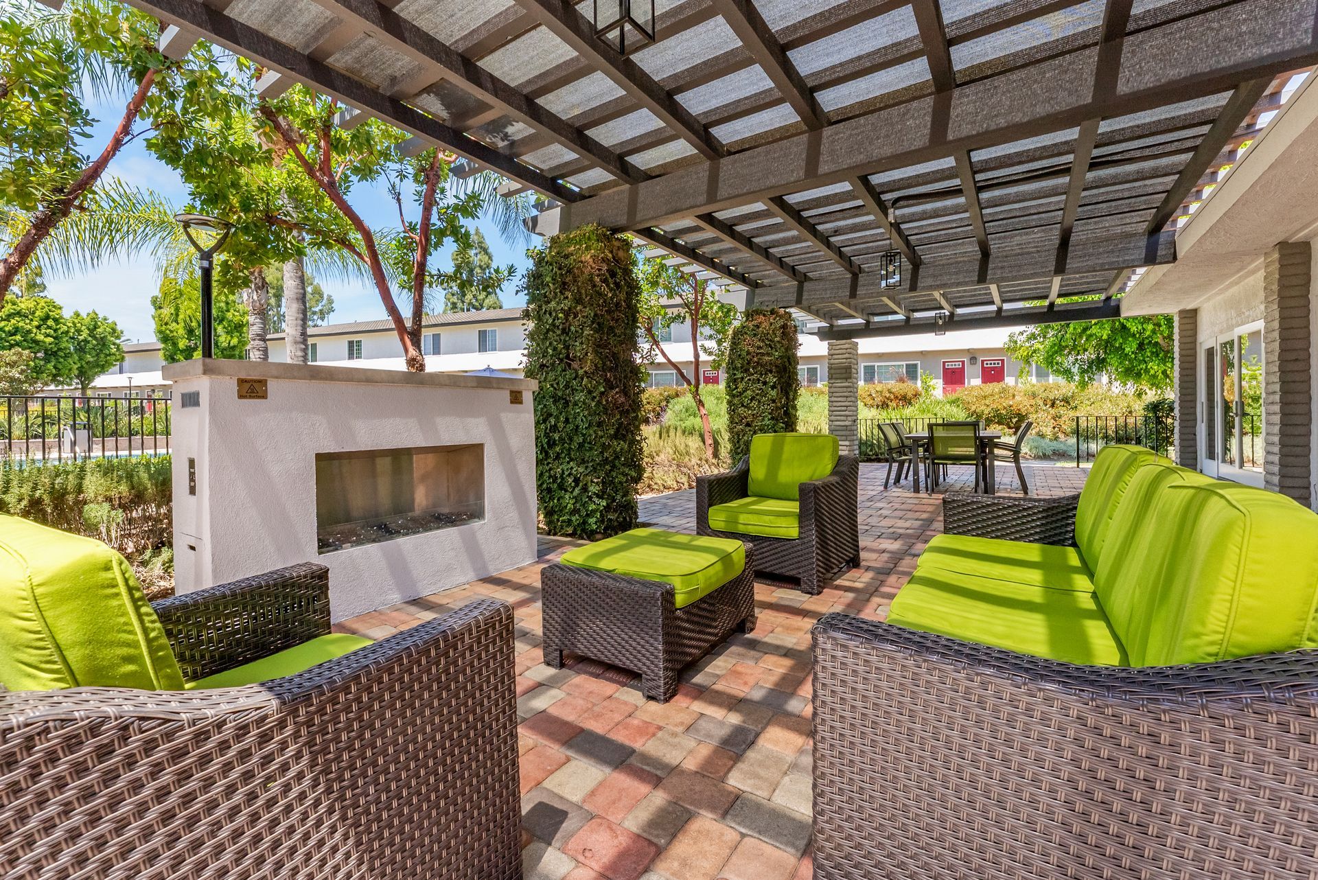 outdoor fireplace and lounge chairs