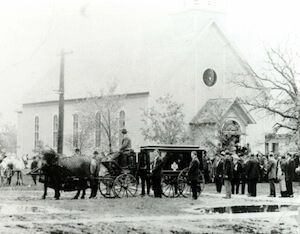 Hearse of John Dingmann in front of St. Marcus Catholic Church, Clear Lake in approx. 1900