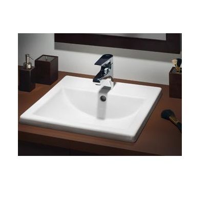 A bathroom sink with a faucet and soap dispenser
