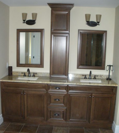 A bathroom with two sinks and two mirrors