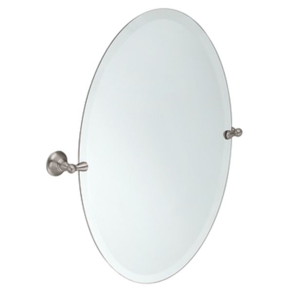 An oval mirror with a stainless steel frame