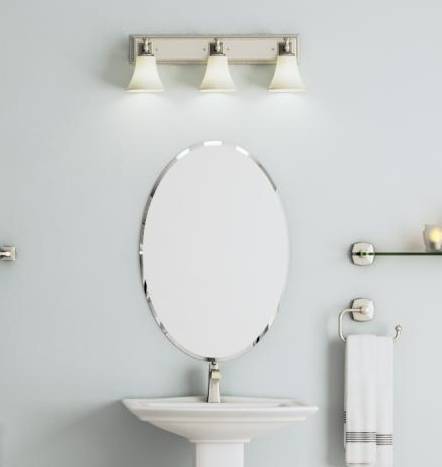 A bathroom with a sink , mirror , and towel rack.