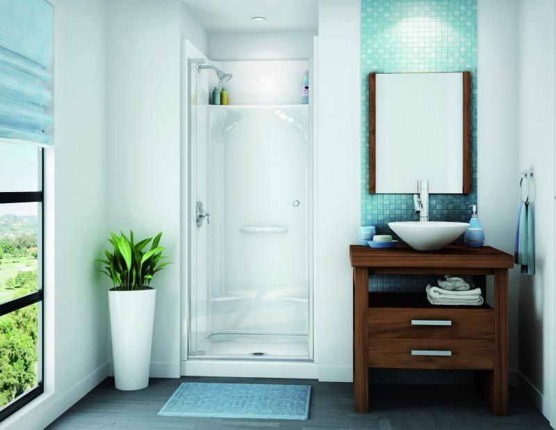 A bathroom with a shower , sink , mirror and window.