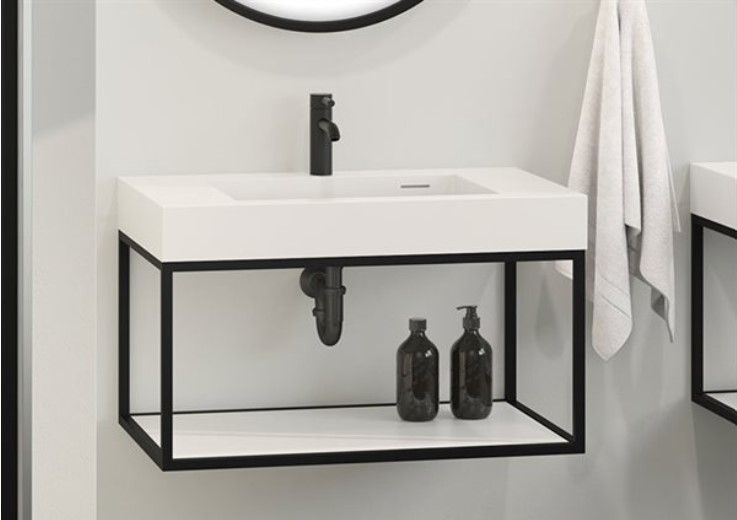 A bathroom with a sink and two bottles on a shelf.