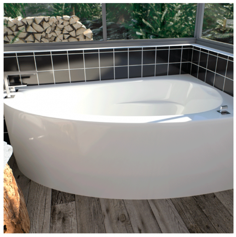 A white bathtub in a bathroom with black tiles