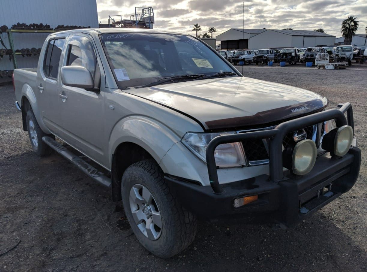 A Silver Truck With A Black Bumper Is Parked In A Parking Lot — Scott's 4WD Parts Plus In Lightning Ridge, NSW