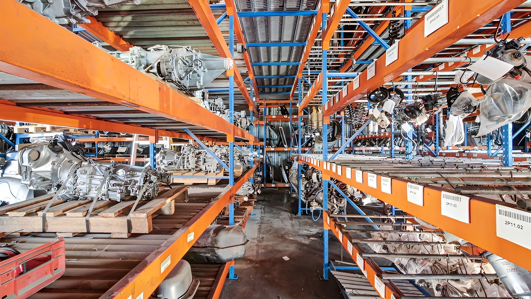 A Large Warehouse Filled With Shelves Filled With Lots Of Parts — Scott's 4WD Parts Plus In Dubbo, NSW