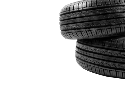 Two black car tires stacked against a white background. | Mike's Garage CC