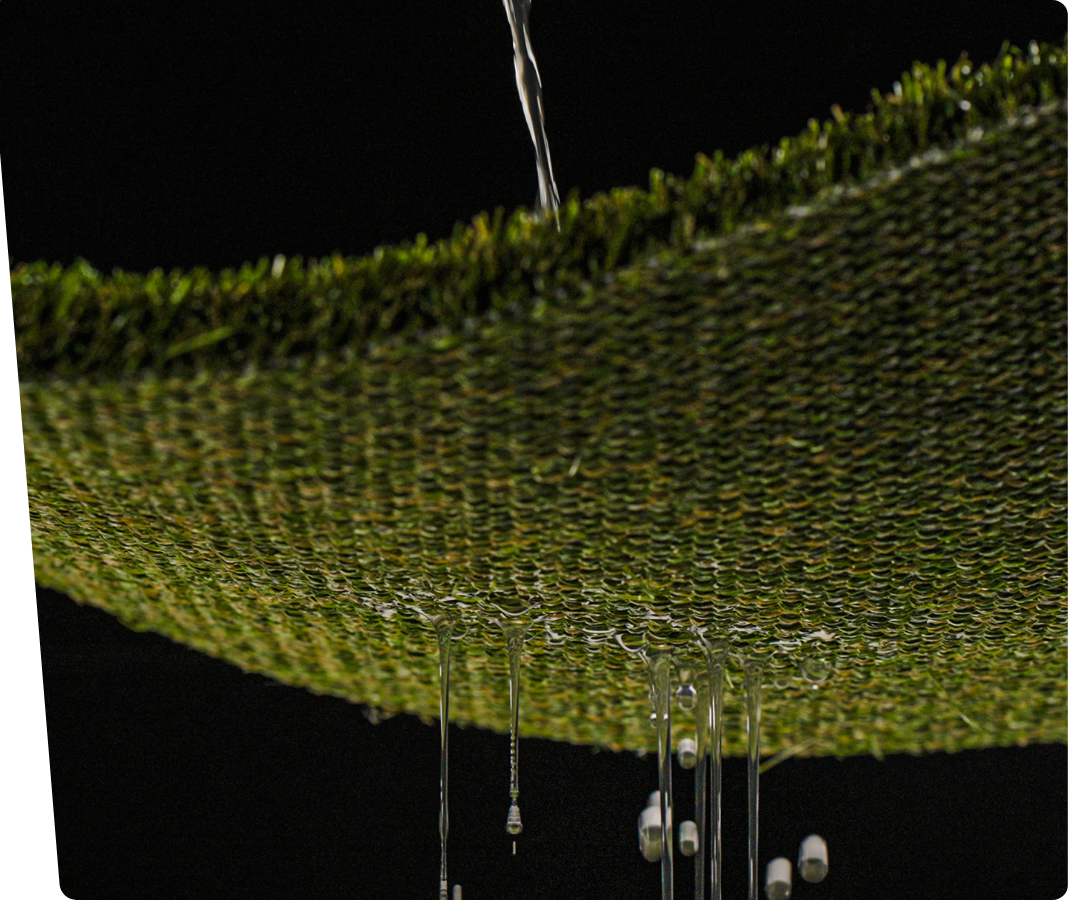 grass for dogs a close up of a piece of artificial grass on a white background.