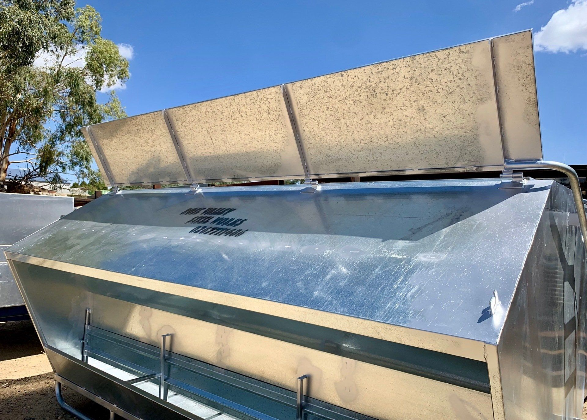 close up of steel cattle feeder
