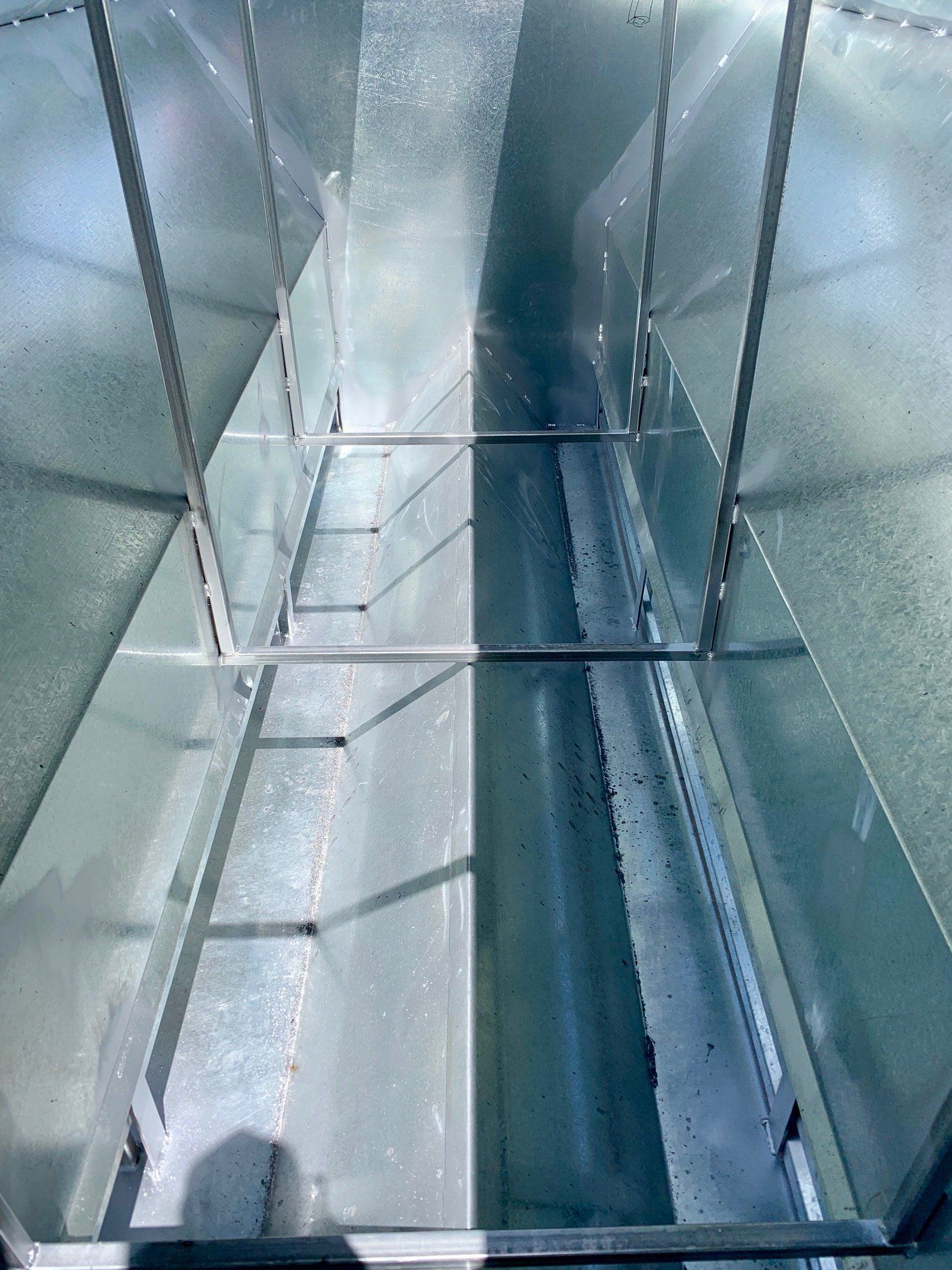 close up view of inside cattle feeder made by rose valley steel works