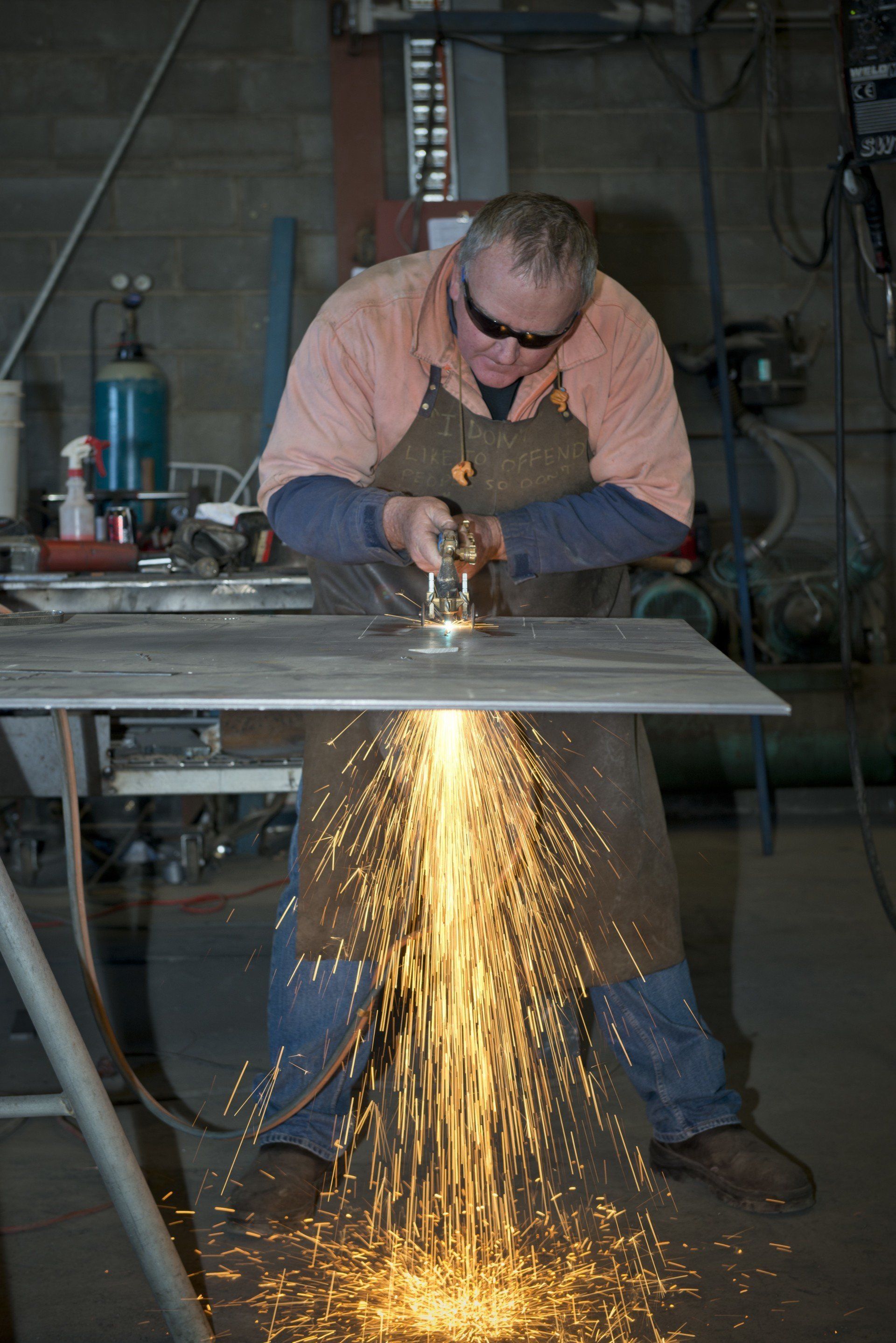 portrait shot of man welding sheet metal
