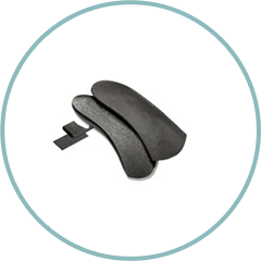 A pair of black insoles in a circle on a white background