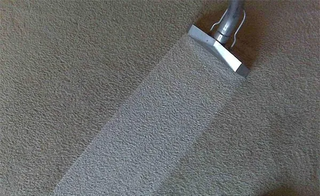 Cleaning the Carpet with Vacuum — New Castle, PA — DiCaprio Carpet Cleaning