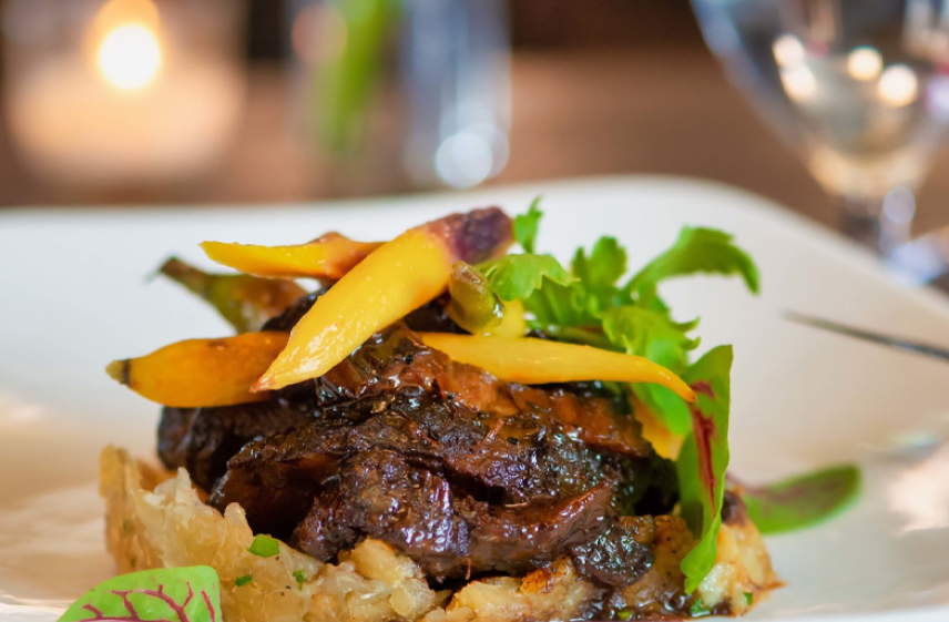A close up of a plate of food on a table.