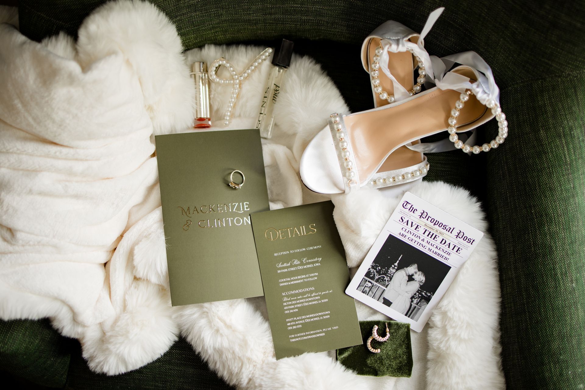 Olive and ivory invitation flat lay