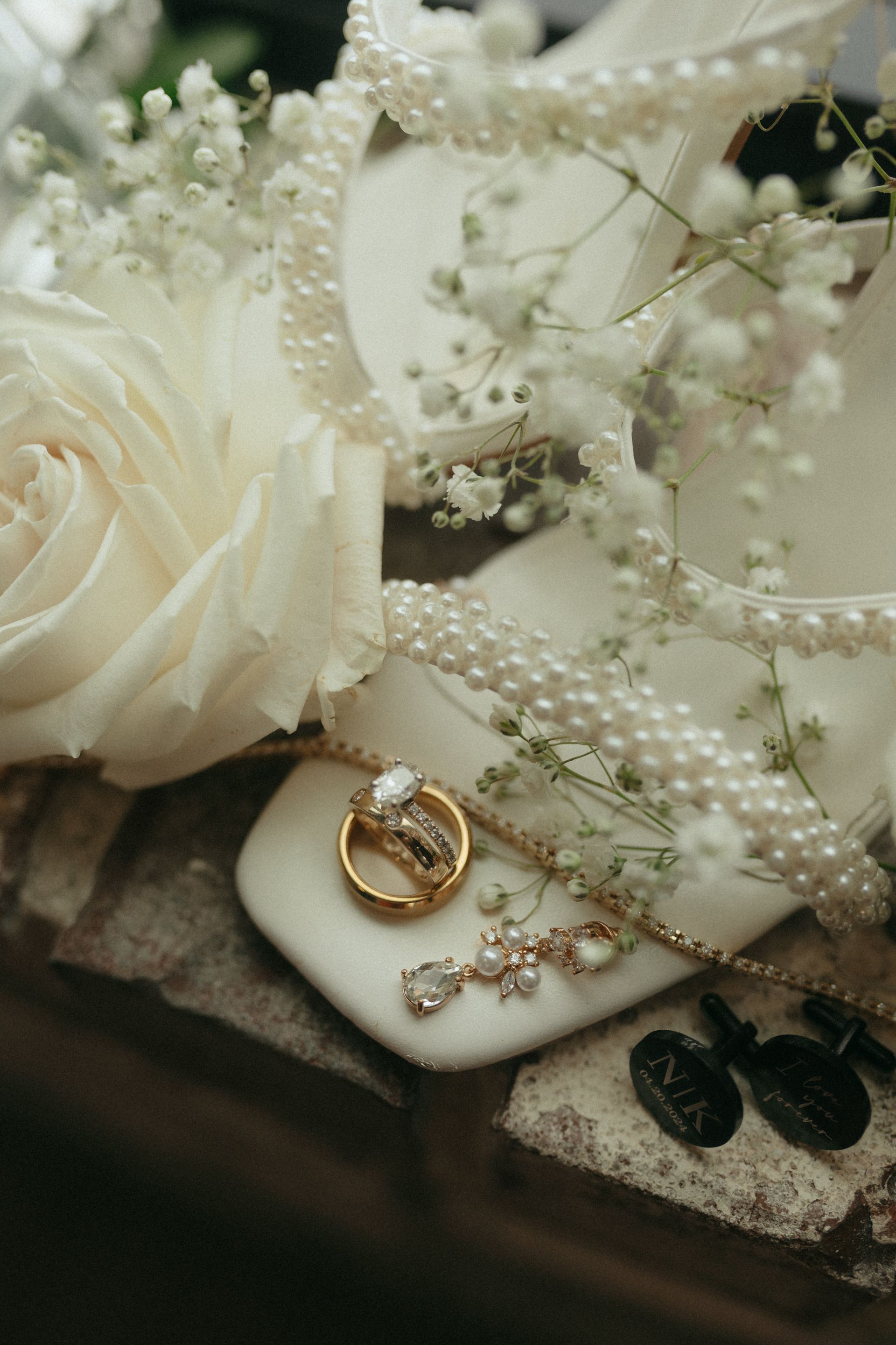 Bridal shoes, flowers, and rings