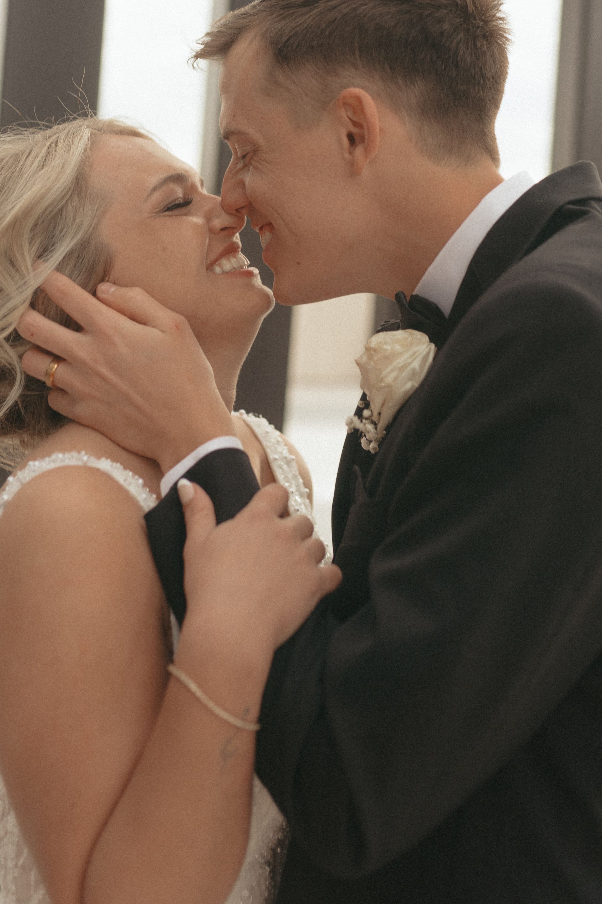Bride and groom laughing