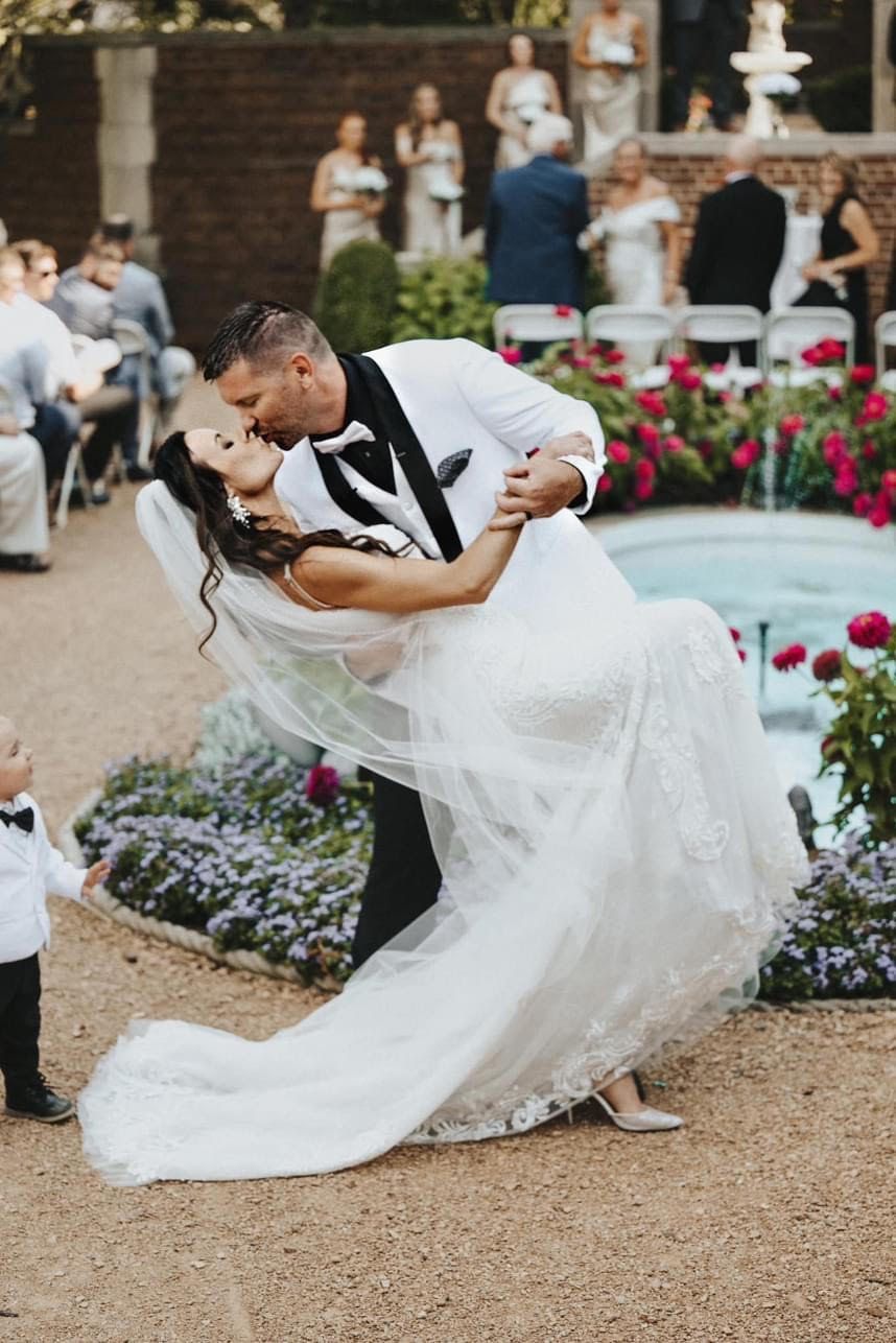 Bride and groom just married kiss