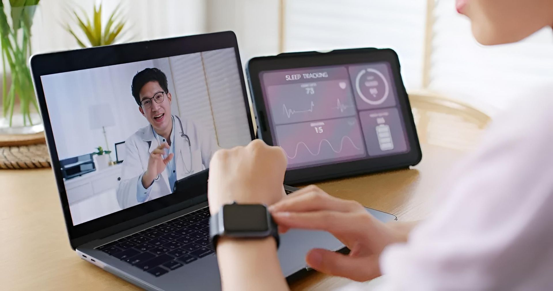 Woman Consulting With a Doctor via Video Call, While Reviewing Health Data on a Tablet and Smart Watch — C & D Manufacturing In Caboolture, QLD