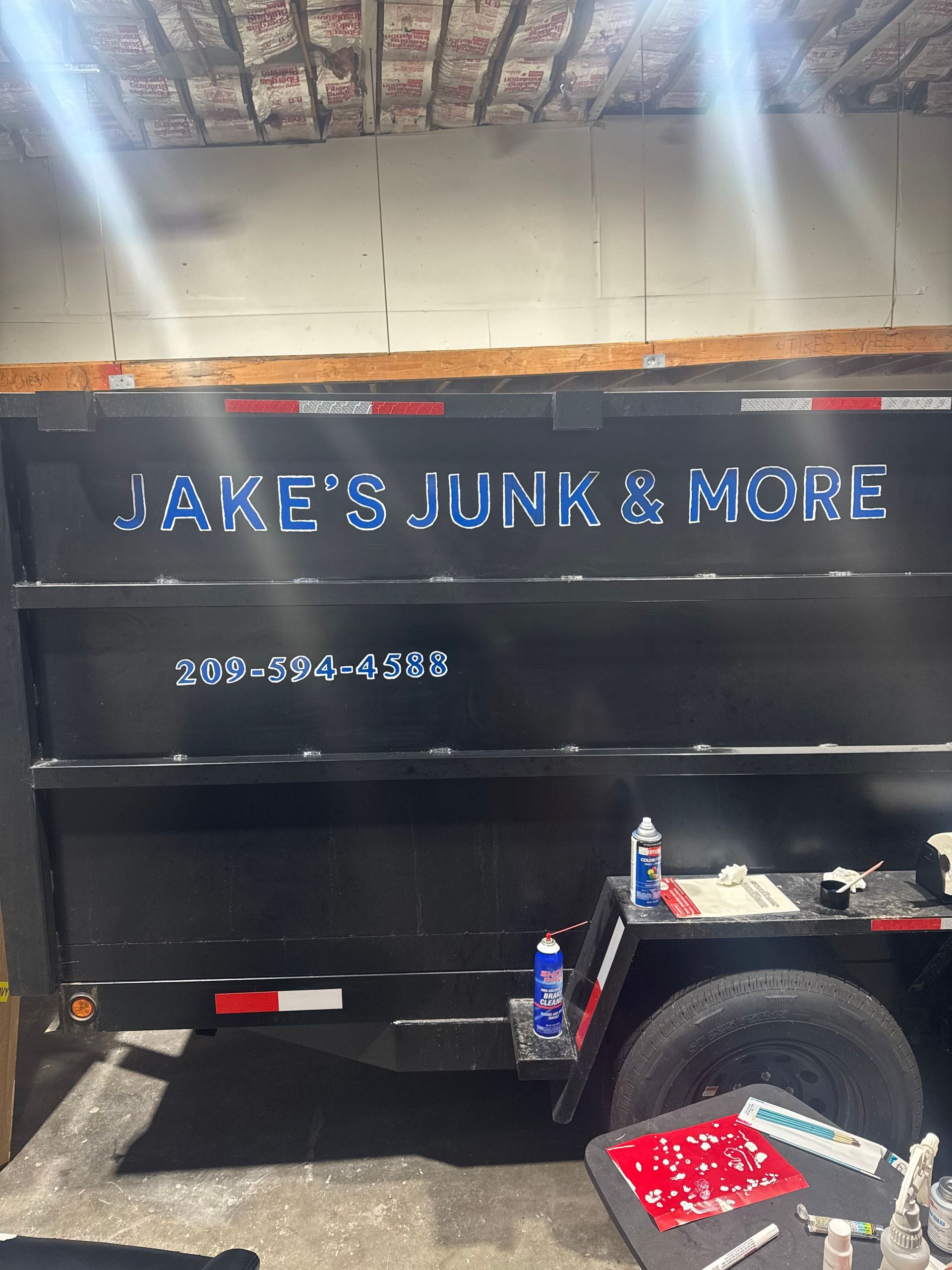 Black dump trailer with