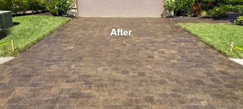 A picture of a driveway after being cleaned - Port Charlotte, FL - MD Pressure Cleaning & Soft Wash