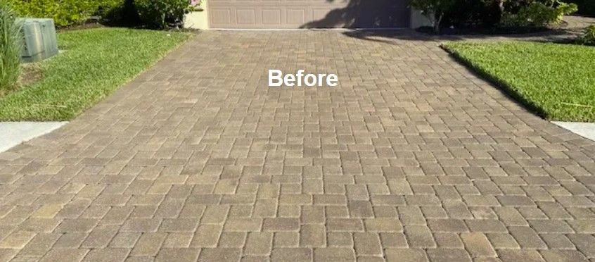 A picture of a driveway before being cleaned - Port Charlotte, FL - MD Pressure Cleaning & Soft Wash