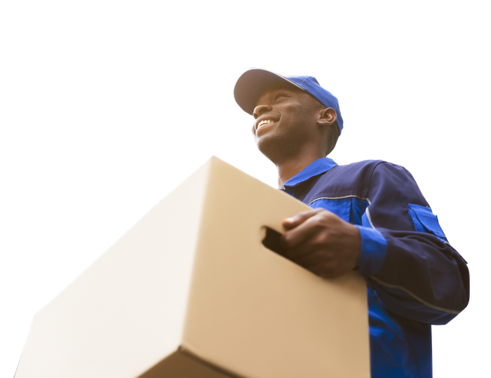 A man in a blue uniform is holding a cardboard box.