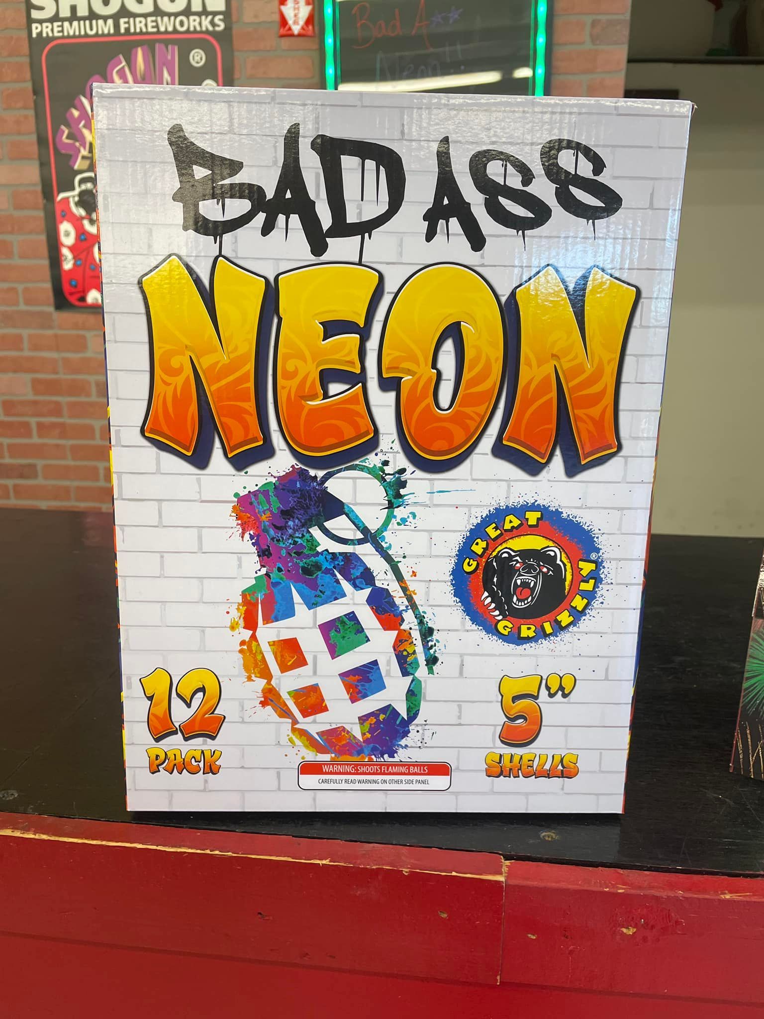 A sign that says badass neon on it