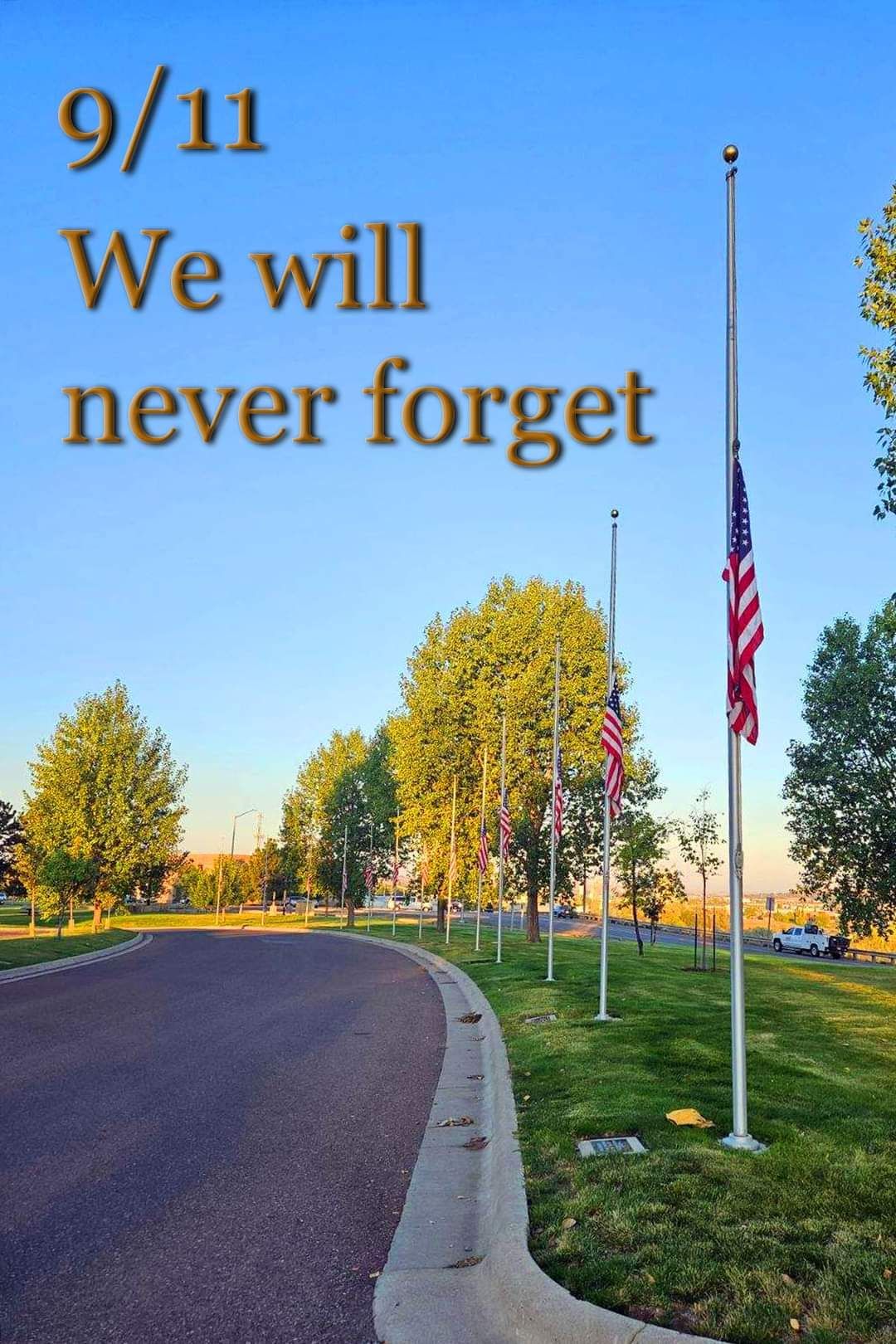 9/11 we will never forget is written on a poster